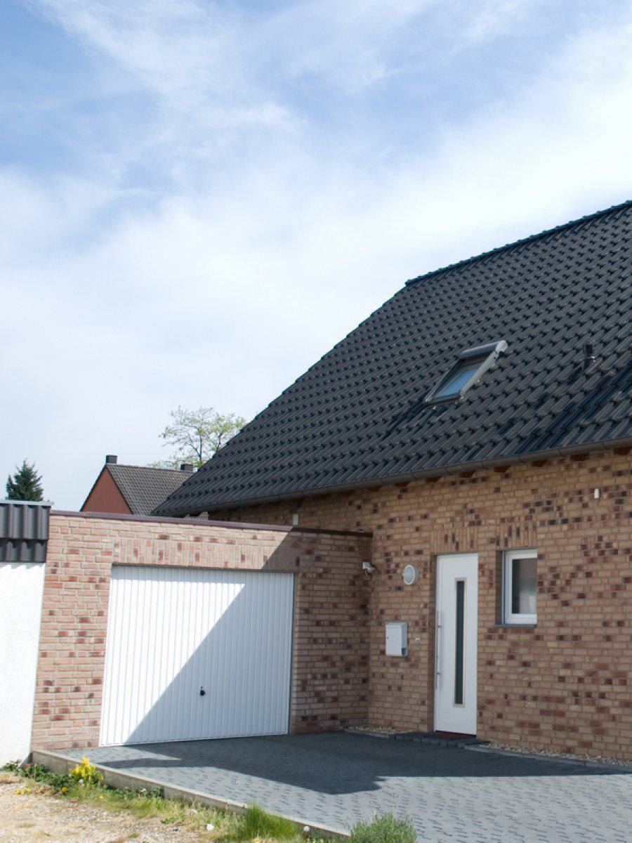 Schwarz Bau GmbH: Wegberg - Einfamilienhaus in 1 1/2 geschossiger bauweise